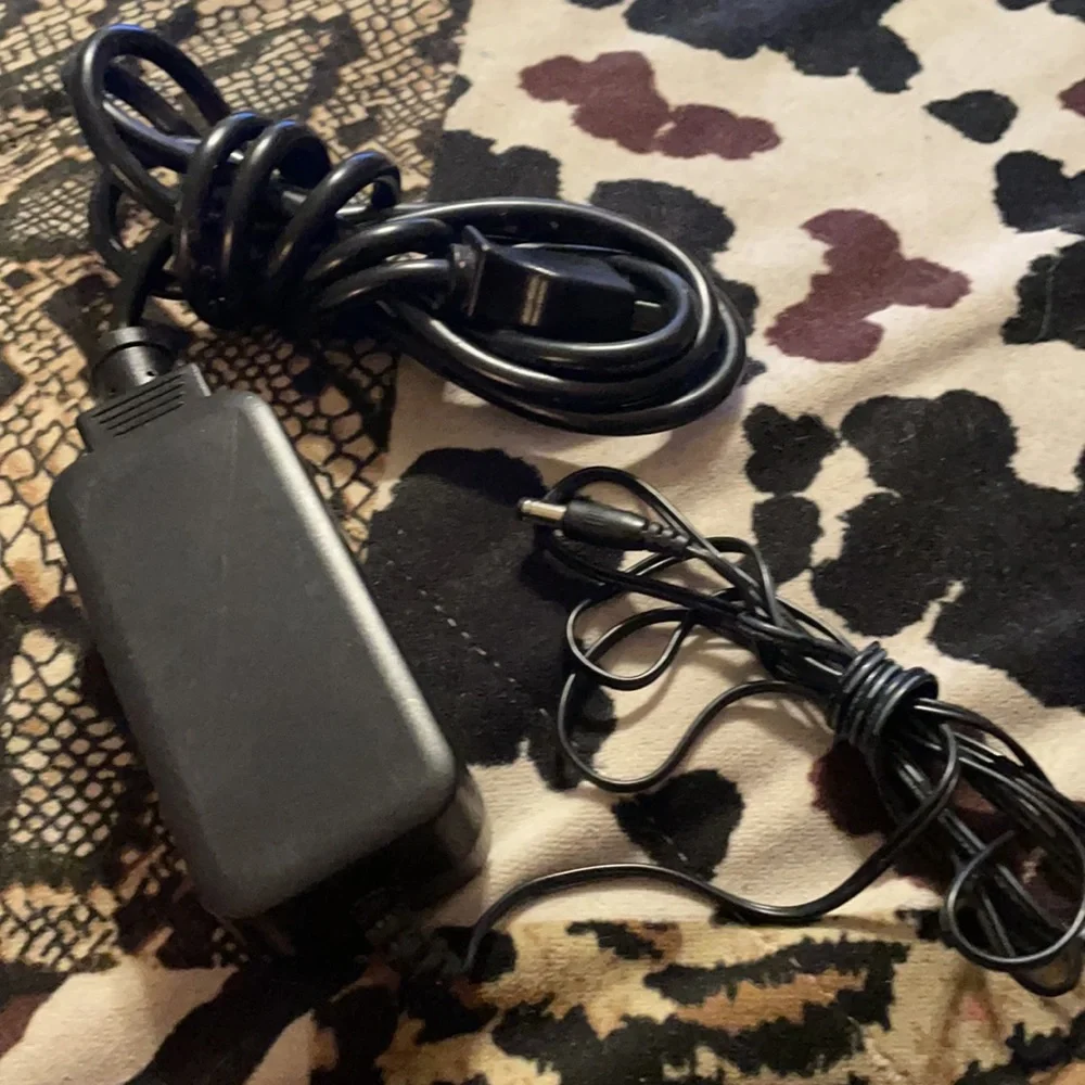 Be-Well Electronics Co,LTD AC Power Adapter Model: ZD0001D